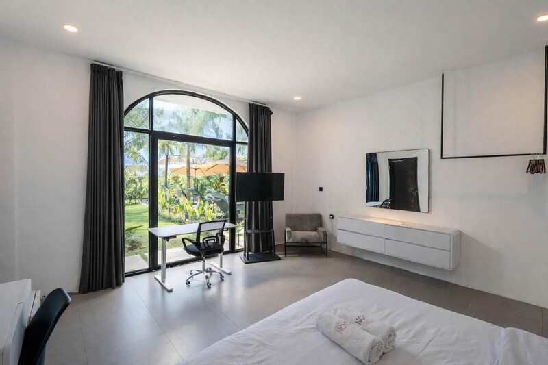 Private bedroom suite with workspace at foundera Bali